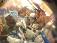 This picture shows the crew in their final examinations in the Soyuz simulator.