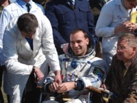 Mark has his pulse read by one of the ground recovery surgeons.