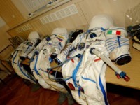 These suits aren't made for walking. The spacesuits are waiting.