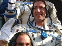 light Commander Yuri Gidzenko, Italian Cosmonaut Roberto Vittori and Mark Shuttleworth wave goodbye to family and friends who have come to give them a heroic send off.